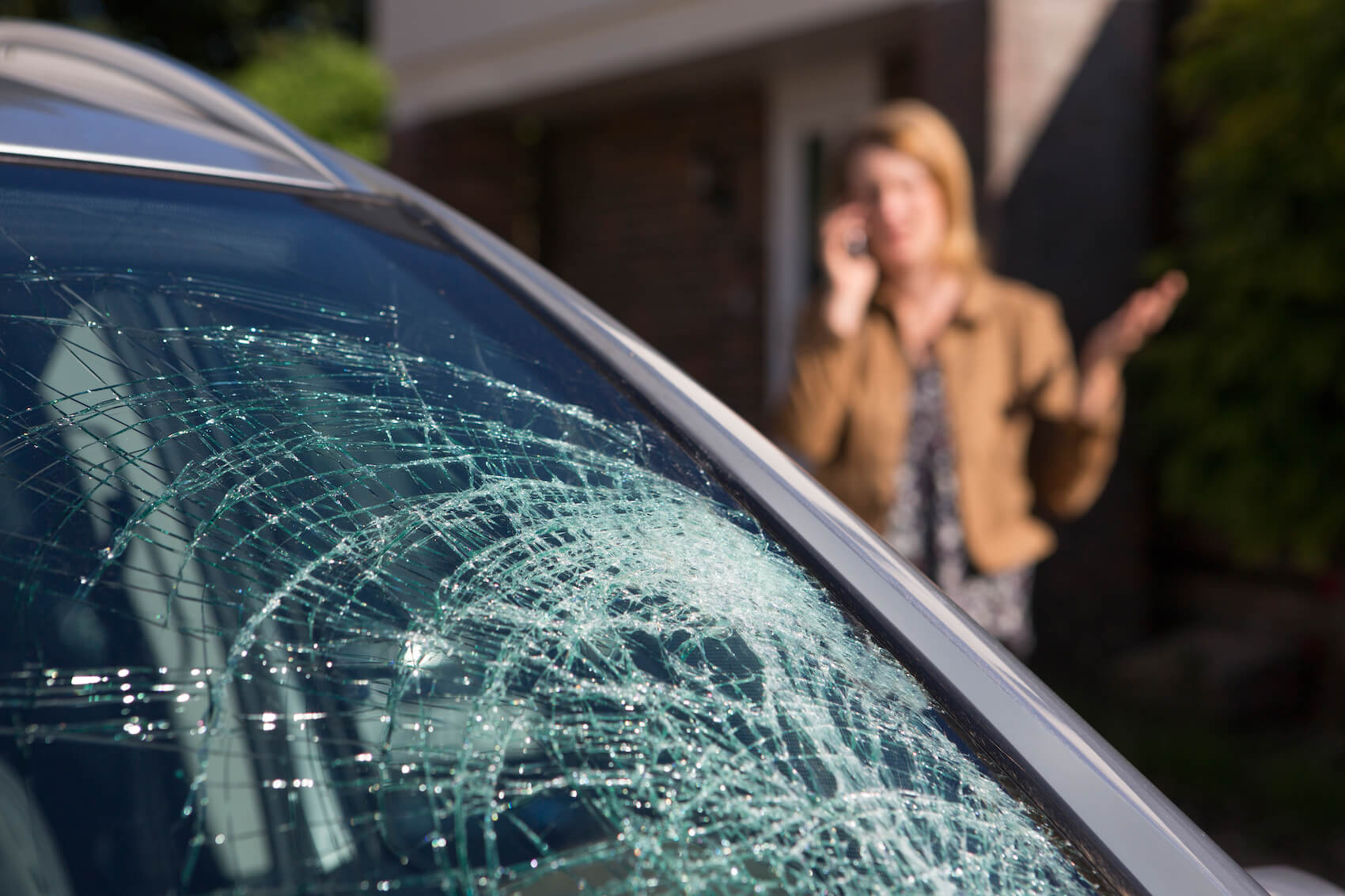 Auto glass breaks in collision Lansing, MI
